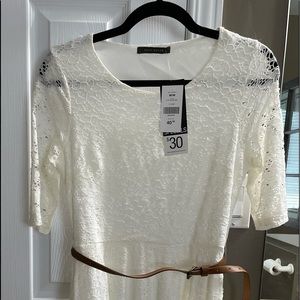 Suzy Shier stretch lace A-line dress with back cutout shape & accent belt